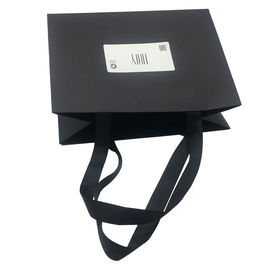 Ribbon Handle Large Paper Carrier Bags Black Color Paperboard Material supplier