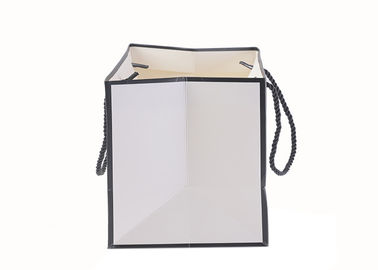 OEM / ODM White Merchandise Bags , Biodegradable Paper Carrier Bags With Logo supplier