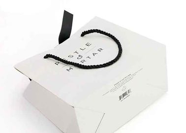 Folding Luxury Custom Printed Paper Bags 157g Art Paper Material High Toughness supplier