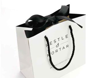 Folding Luxury Custom Printed Paper Bags 157g Art Paper Material High Toughness supplier