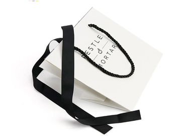 Folding Luxury Custom Printed Paper Bags 157g Art Paper Material High Toughness supplier