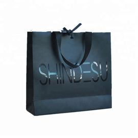 Customized Logo Printed Paper Merchandise Bags Luxury High Bearing Capacity supplier