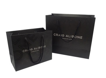 High End Custom Printed Paper Bags / Black Paper Gift Bags Embossed Surface Disposal supplier