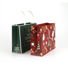 Popular Paper Gift Packaging Bags Biodegradable Customized Weight For Christmas supplier