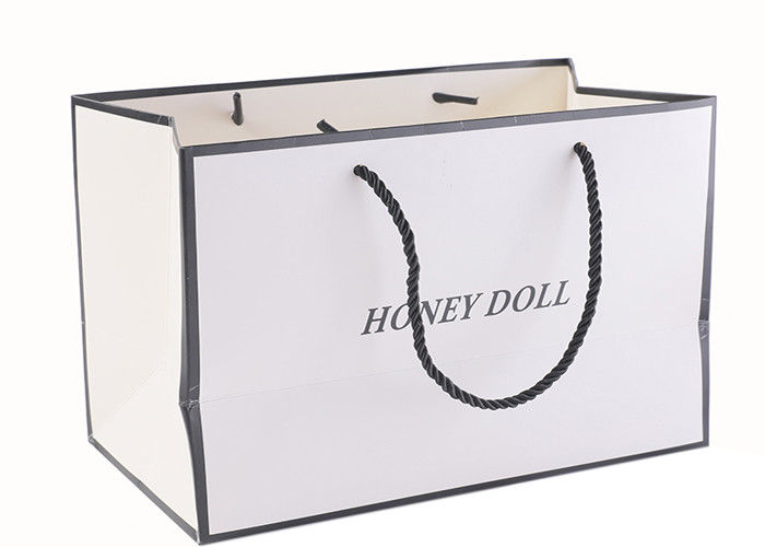 OEM / ODM White Merchandise Bags , Biodegradable Paper Carrier Bags With Logo supplier