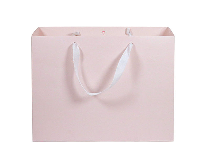 Eco - Friendly Paper Shopping Bags Pink Color With Twill Cotton Rope Handle supplier
