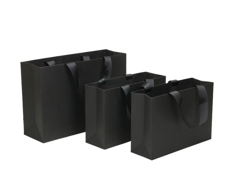 Soft Edge Black Paper Carrier Bags , Recycled Gift Bags Various Shape Available supplier