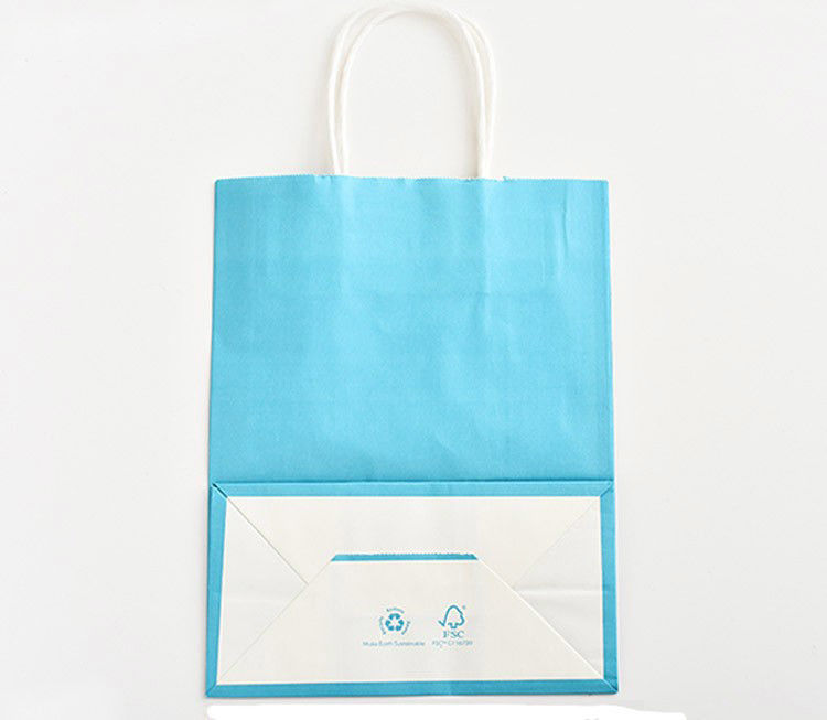 Blue Color Printed Kraft Paper Bags Customzied Logo With Twisted Paper Handle supplier